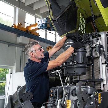 mechanic checking vehicle