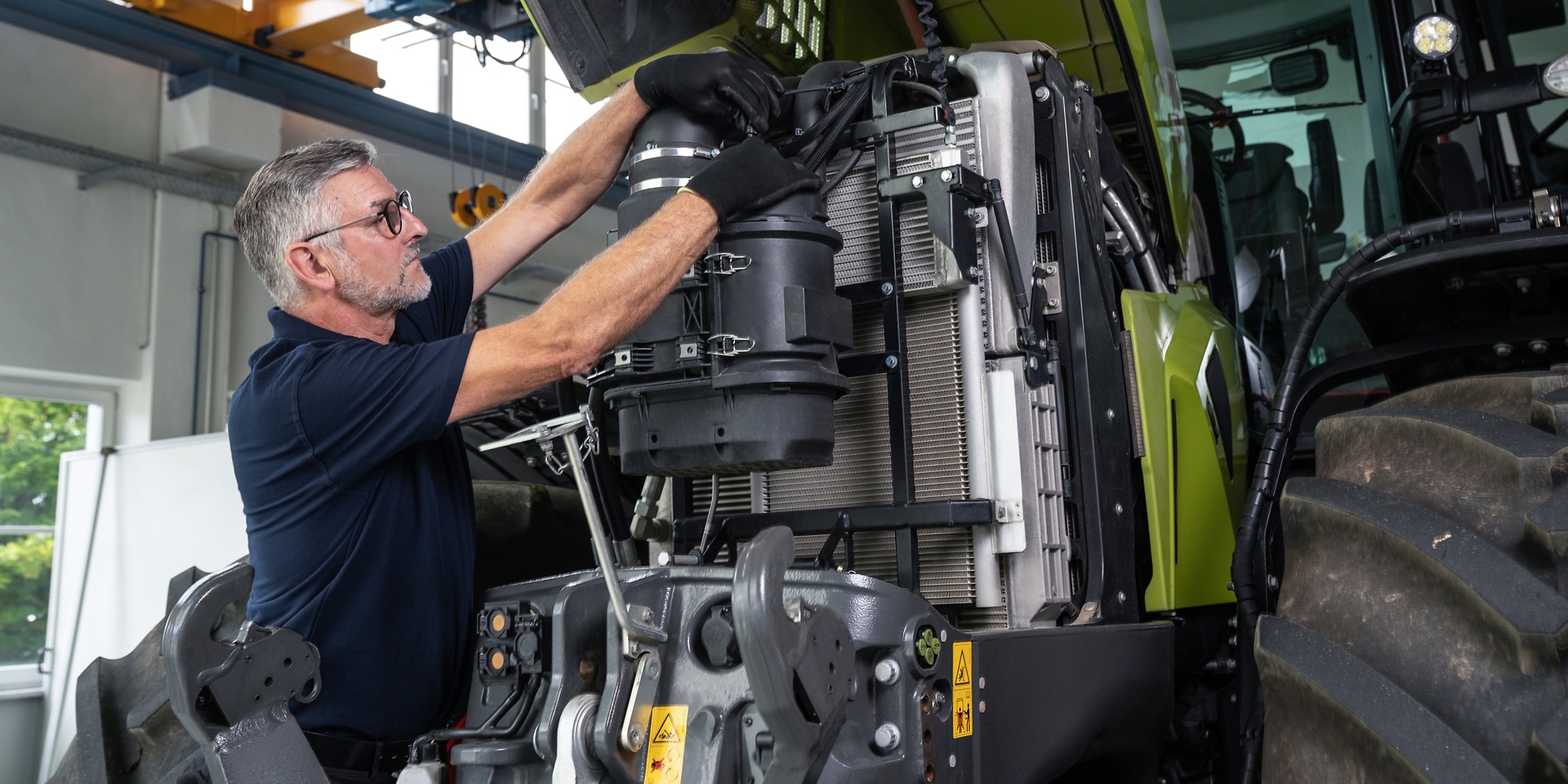 Mechanic checking vehicle