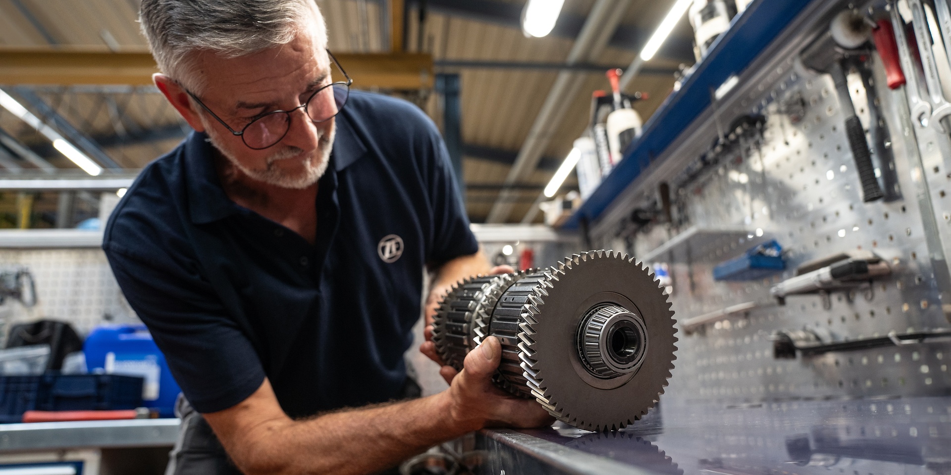 Man repairing with original ZF Aftermarket Off-Highway parts