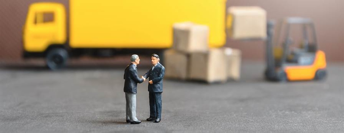 miniature people handshake 