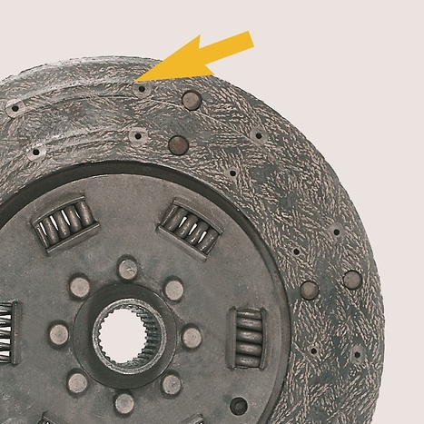 Facings worn down to rivet heads