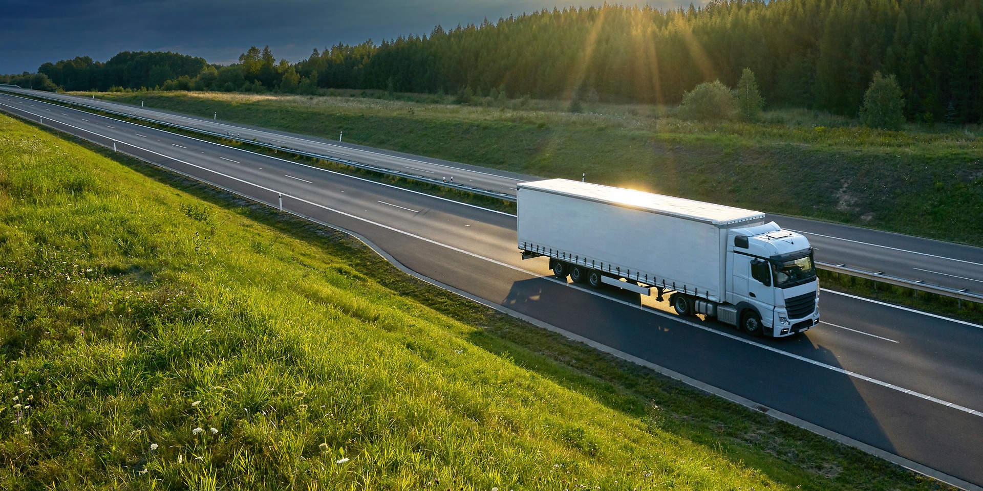 A truck moving on a Road.