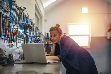 Woman working on Laptop.