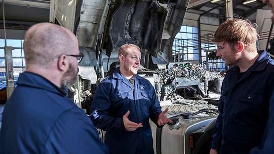 three people in workshop during cv training