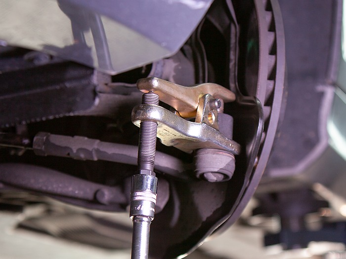  Het trekstangeinde verwijderen